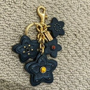Leather black wild flowers charm